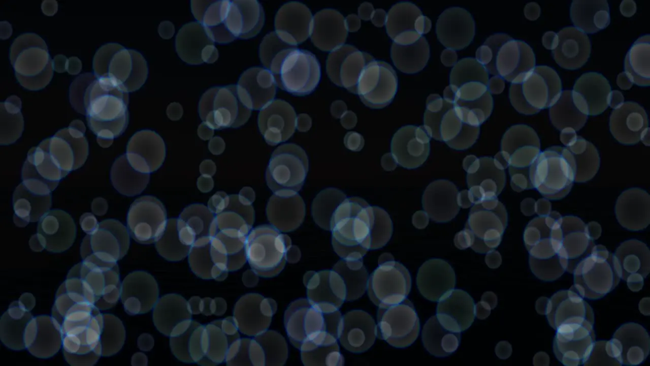 Animation of bubbles drifting upward on black background