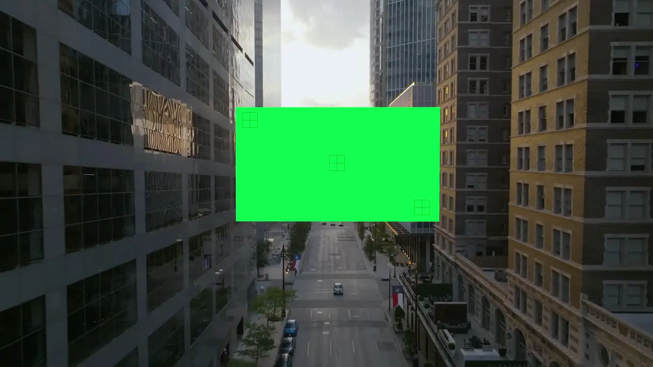 Drone moving toward a Chroma key screen in middle of city high-rise 3D render