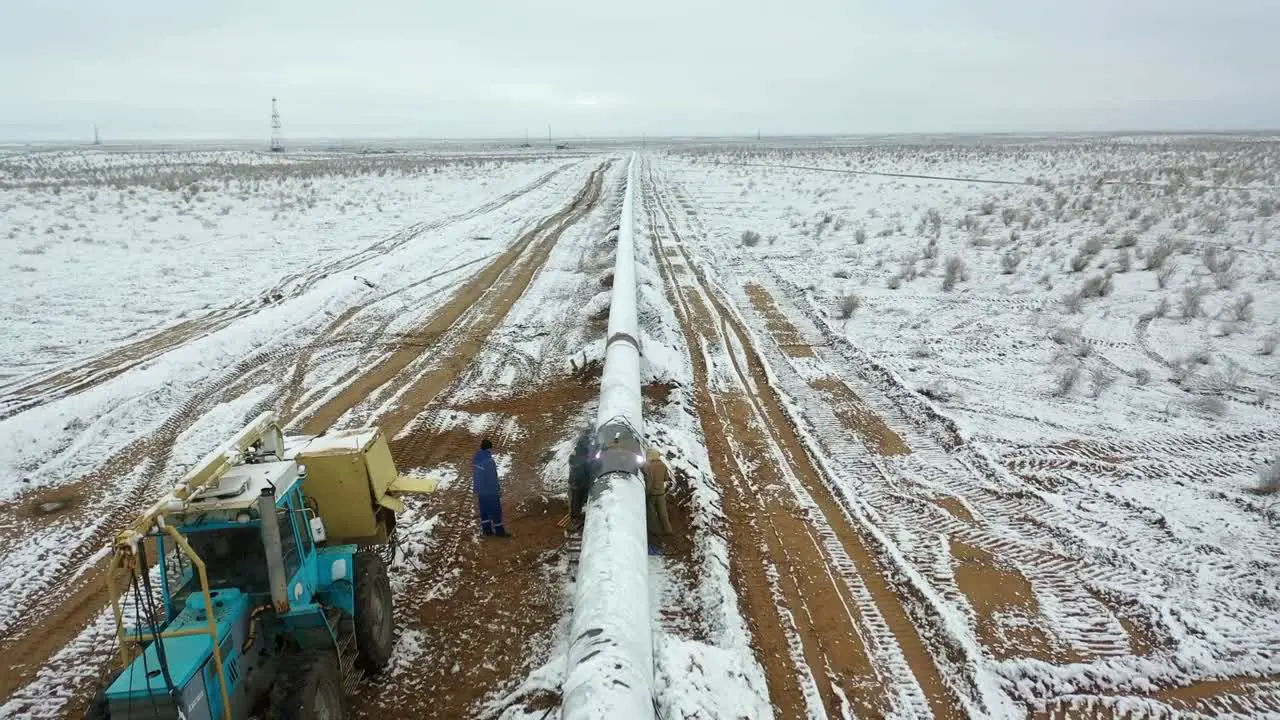 Drone shot of newly constructed gas and oil pipeline in winter