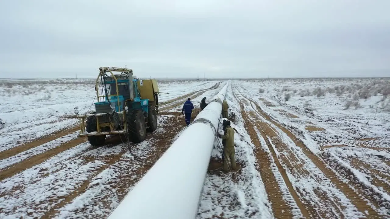 Man working at new pipeline construction welding