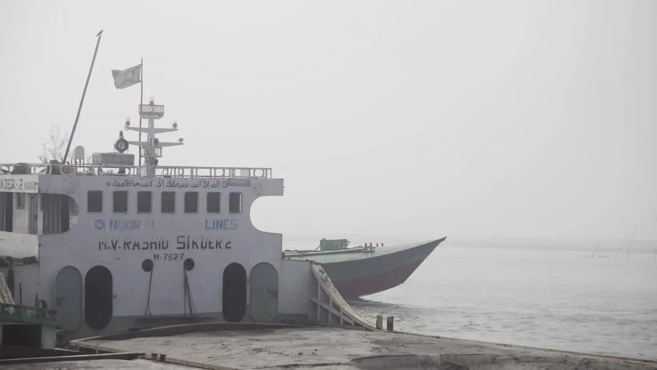 Bangladeshi sand trawler is moving ahead through river water