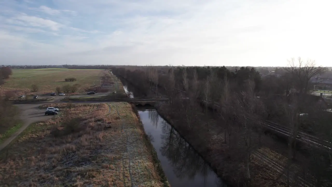 Small River Next to Industrial Area Water Cooling Industry Dolly In Shot