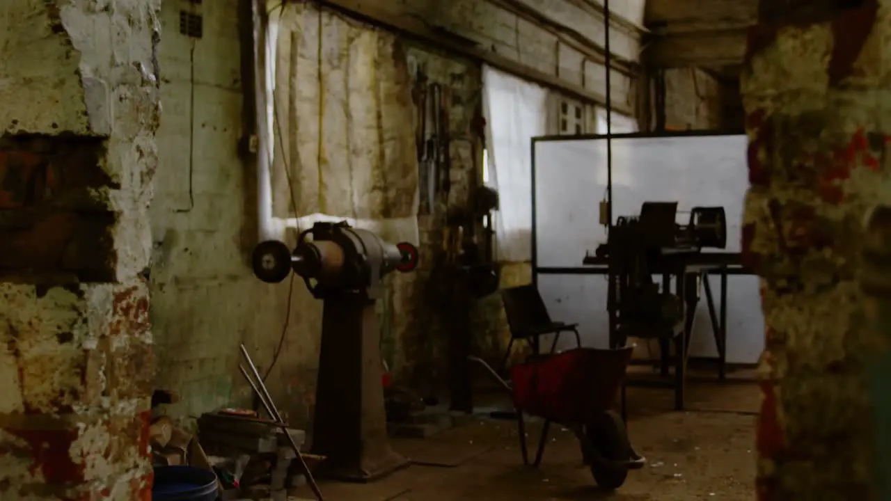 Machine and wheel barrow in workshop 4k