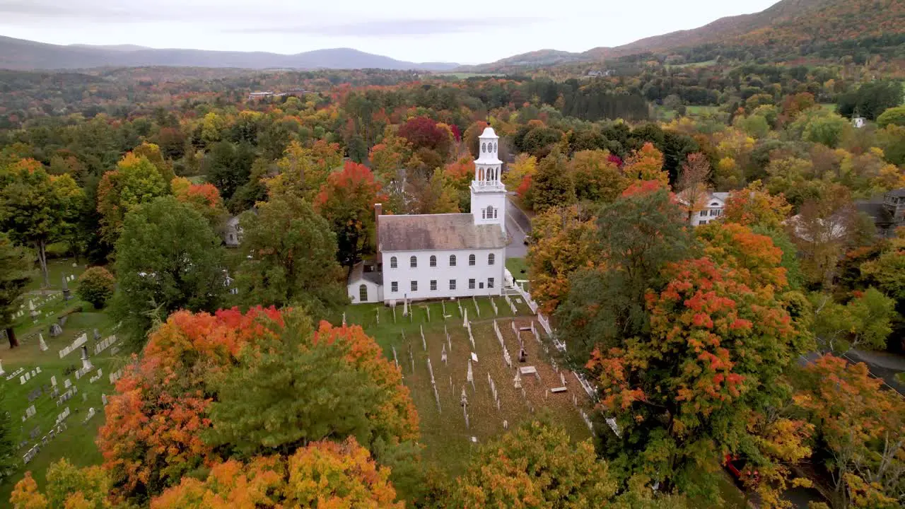 Bennington Vermont aerial tilt up from church in fall autumn