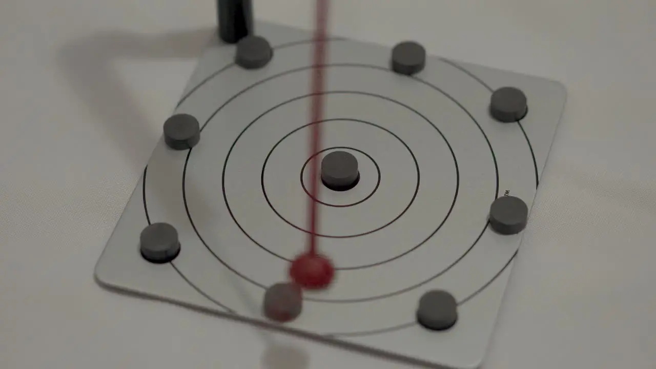 Randomly Oscillating Magnetic Pendulum in Motion