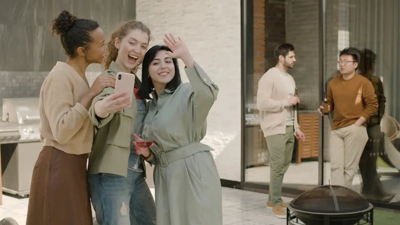 A Beautiful Group Of Three Girls Take A Selfie