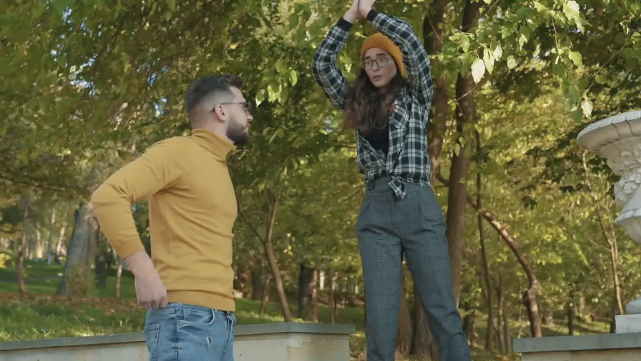 Young Female And Male Friends Joking And Laughing