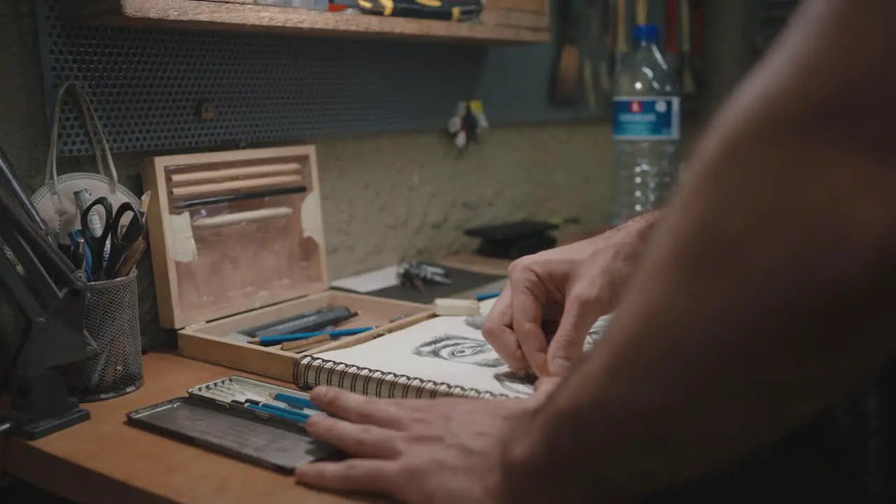 Artisan Crafting Sketches in Workshop Low-Level Shot of Hands drawing