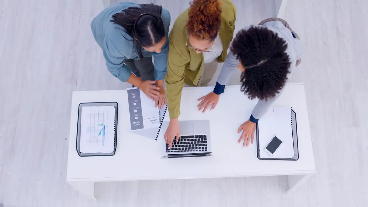 Documents laptop and business people planning