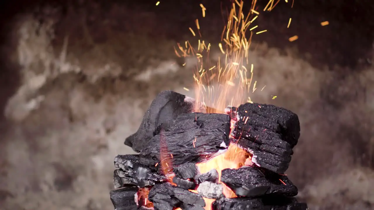 Mountain of coal with constant flame coming out of the center