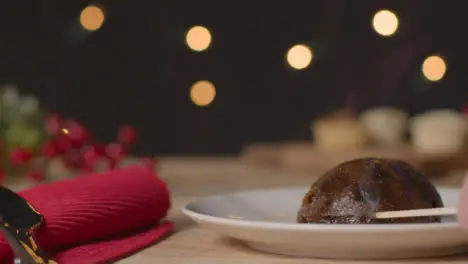 Close Up Shot of Christmas Pudding Being Lit with Match