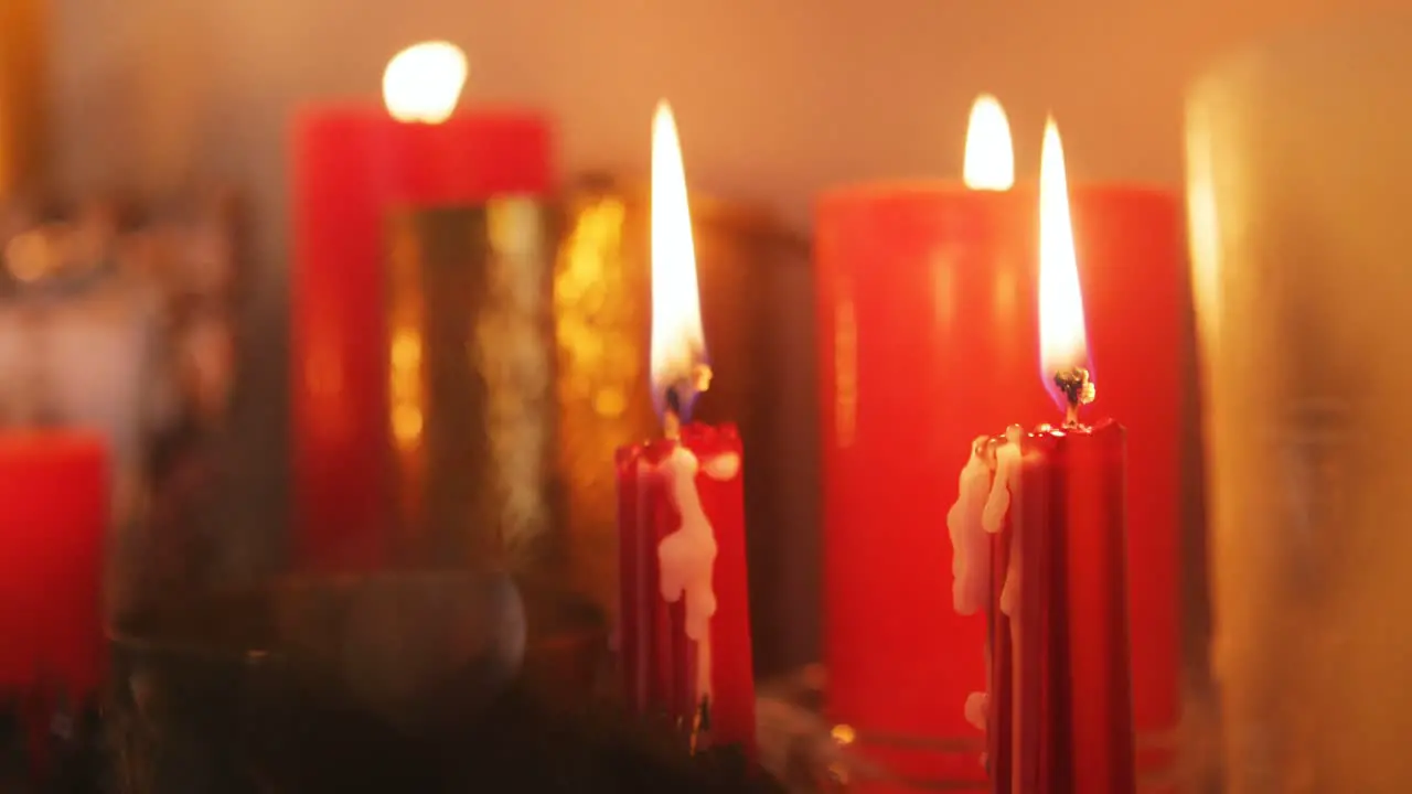 Close-up of candles burning