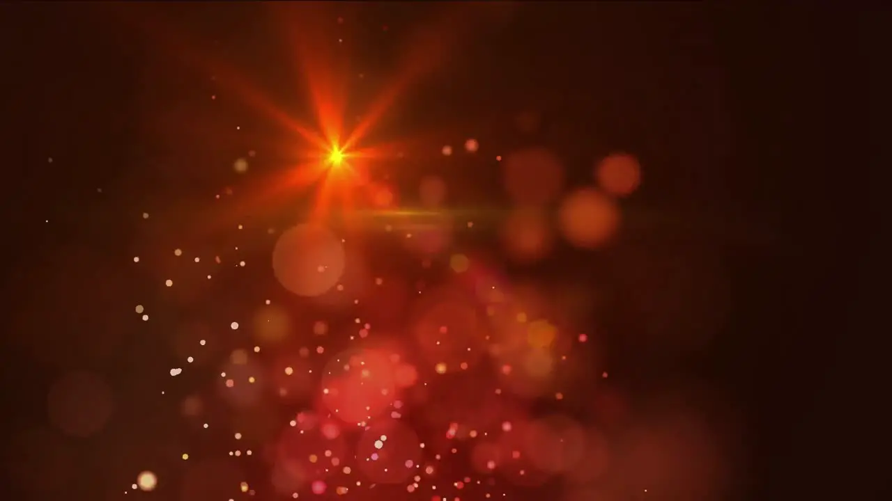 Digital animation of flame of bokeh lights and spot of light against red background