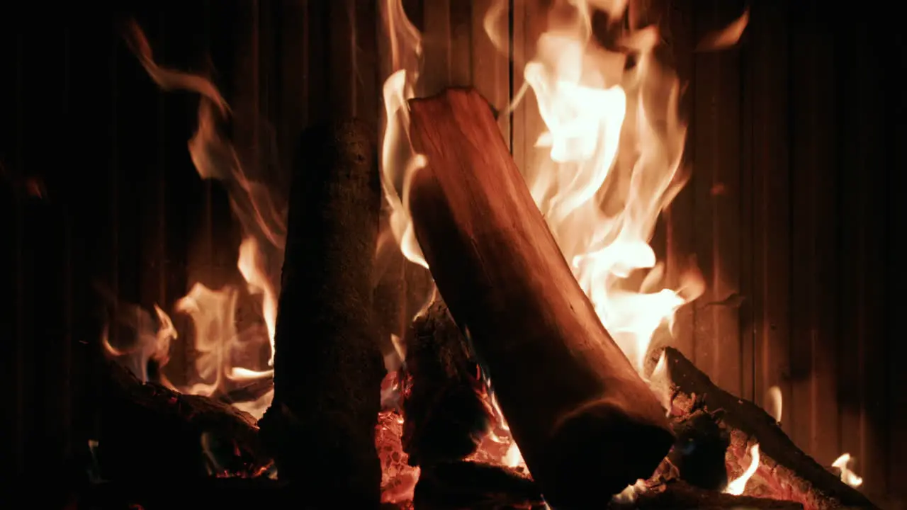 The Wood Is Burning In A Modern Fireplace