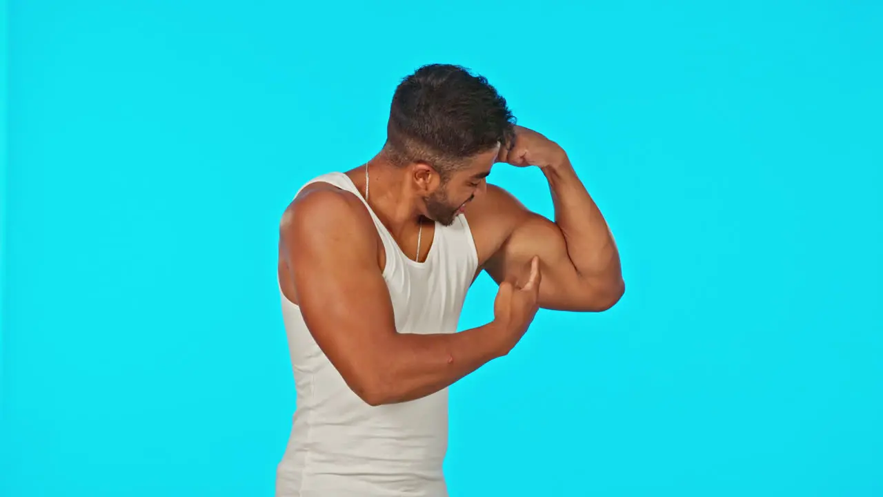 Fitness bicep and man flexing on blue background