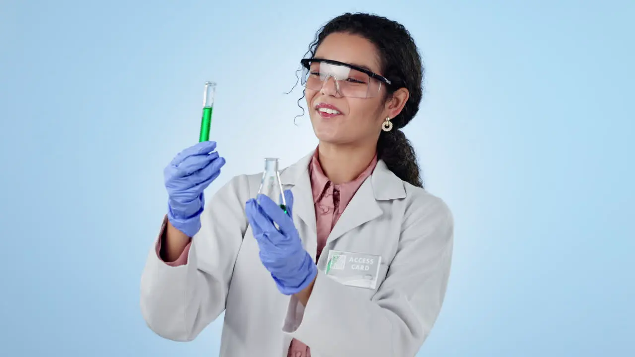 Women scientist and glass beaker for experiment