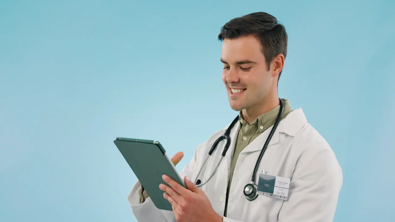 Happy doctor and man with research on tablet