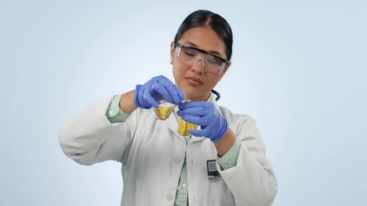 Studio Asian woman or scientist with solution