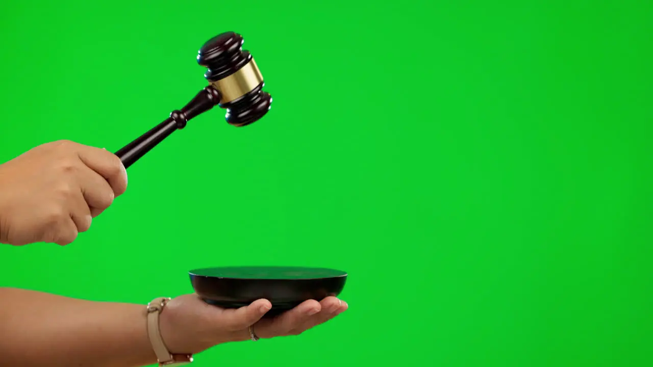 Hands judge and gavel on green screen for law