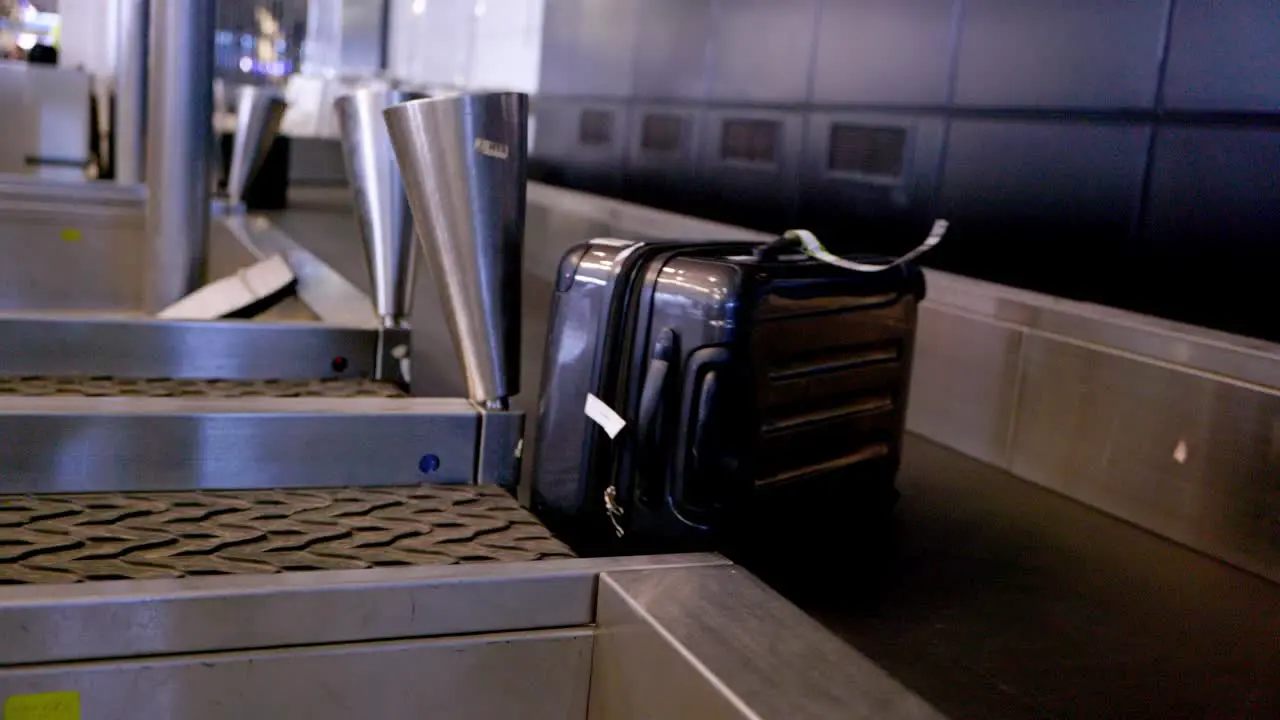 A suitcase on an airplane loading lane