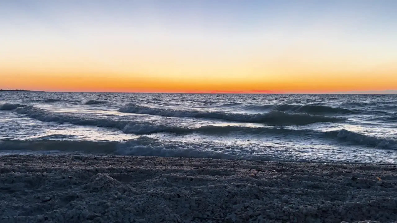 relaxing shot of sea waves in yucatan mexico during sunset