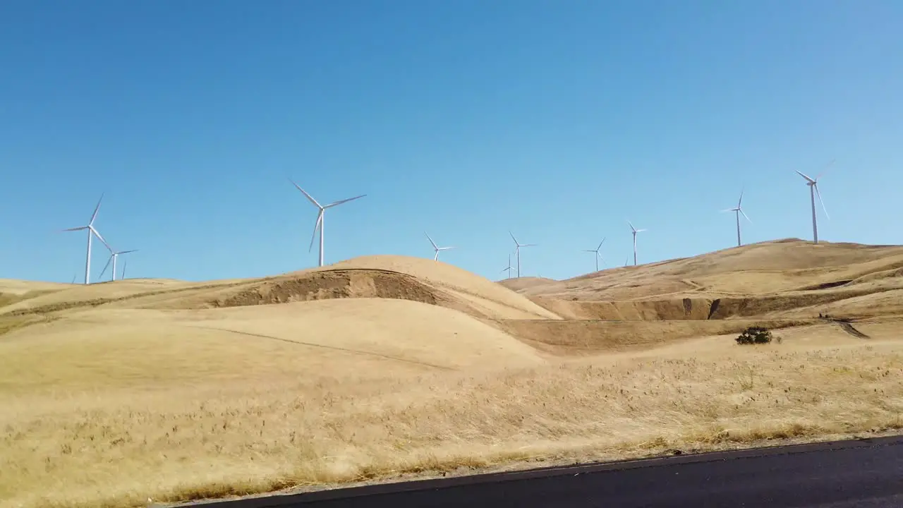 Passing by windmills on the road in California