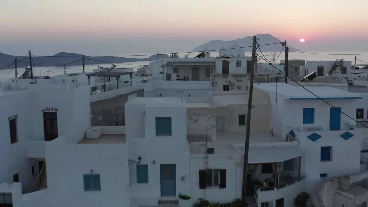 Greek Village with Ocean View at Sunset Aerial