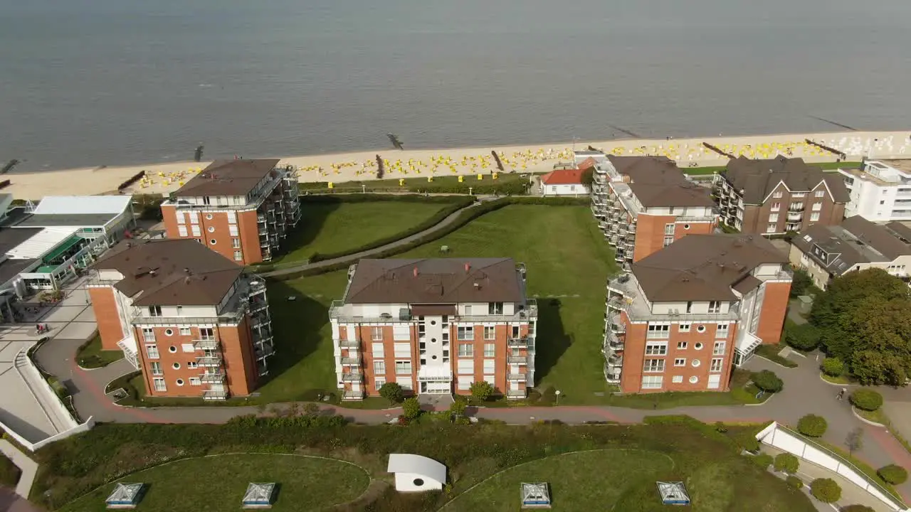 Drone footage of a group of vacation homes directly on the German North Sea coast