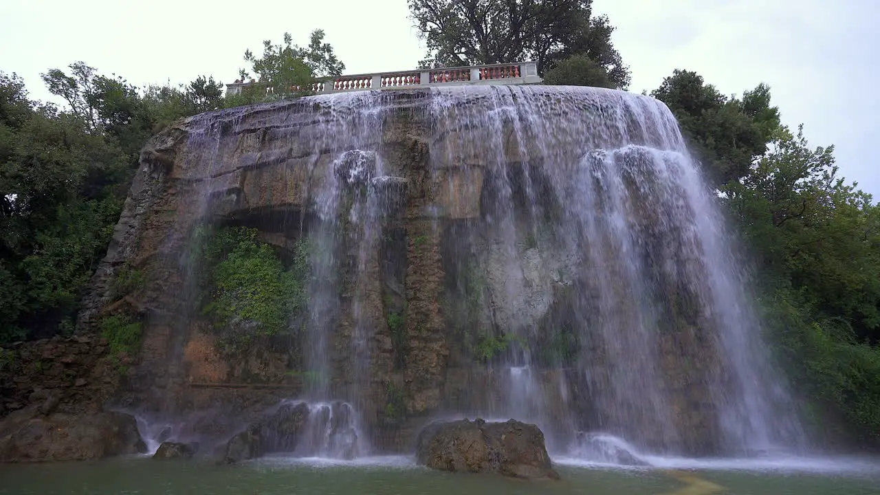 Cascade du Casteu located at the Castle of Nice in the rain