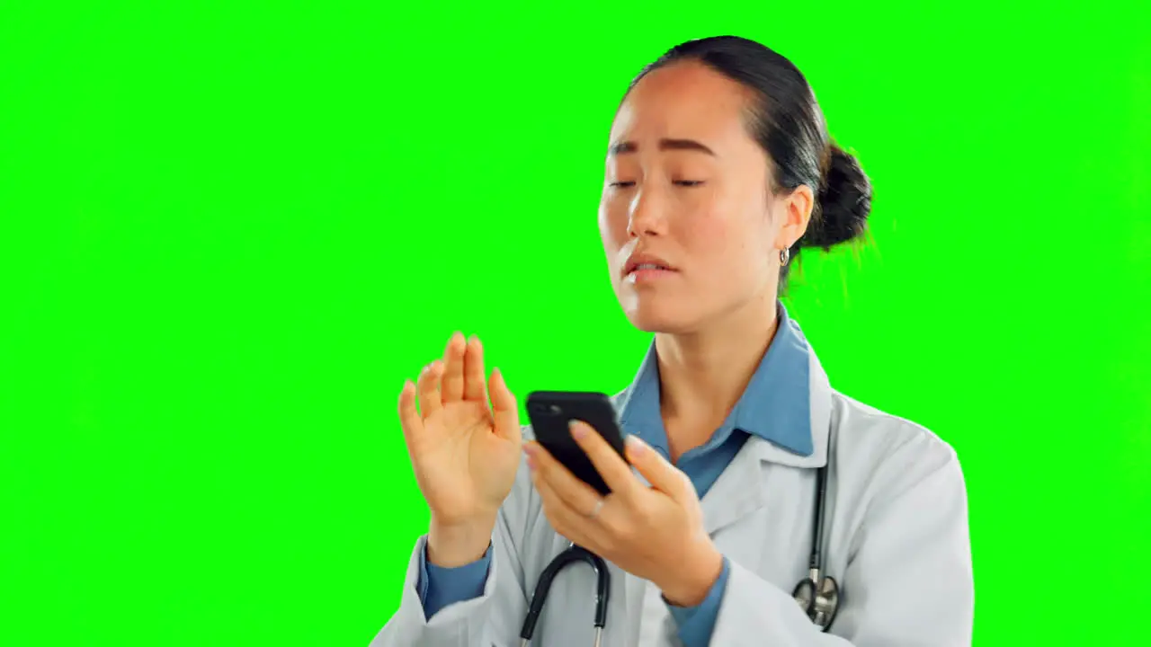 Doctor woman and texting by green screen