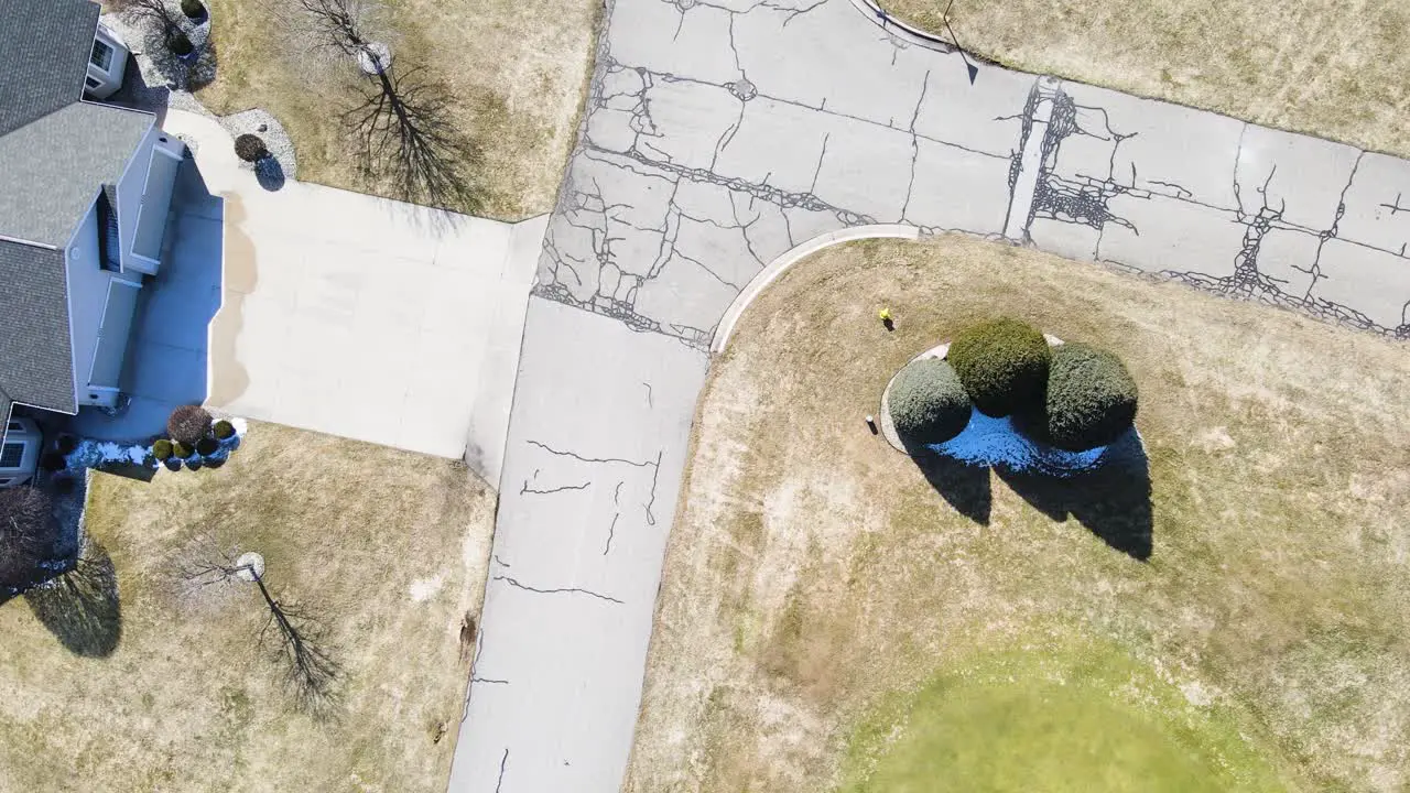 A bird'seye track of a street grid in bright spring light