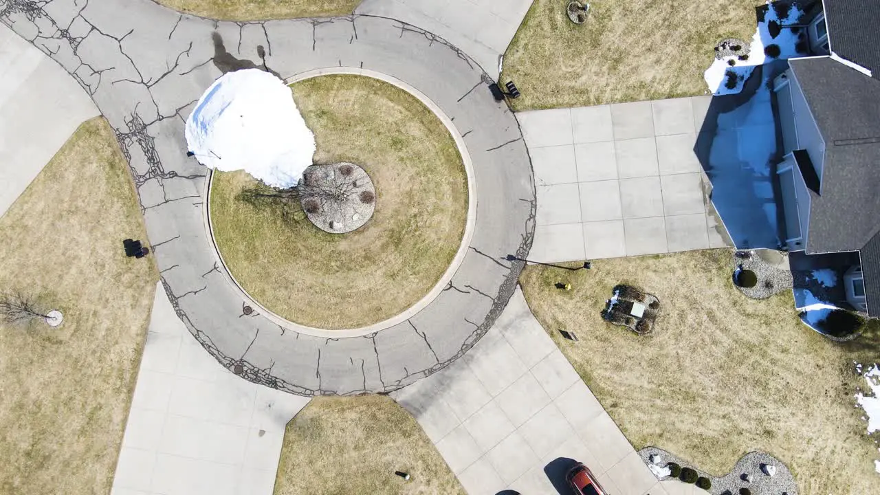 Aerial Spin over a cul-de-sac in the early spring period