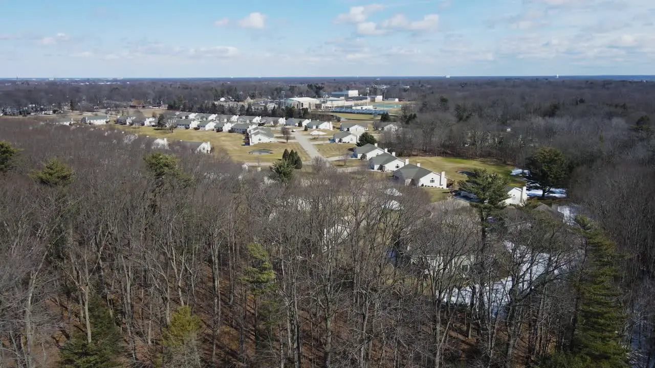 Tracking toward a forested semi-suburb area near Norton Shores