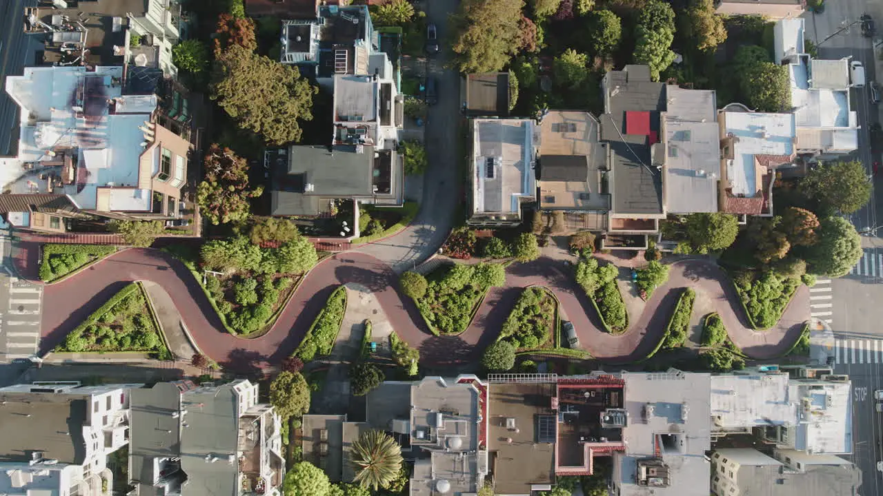 Birds eye view of houses and cars in a neighborhood