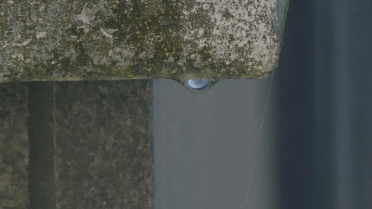 Water is dripping on stone edge