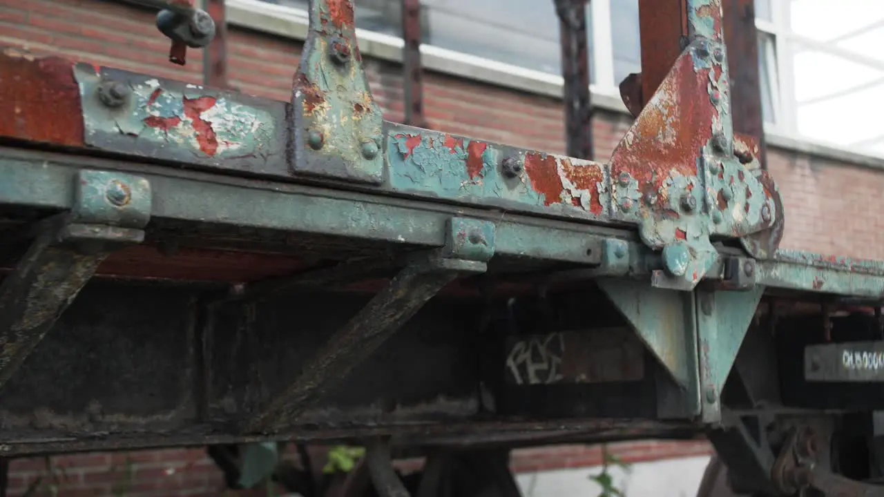 Slow motion footage of an old rusty train wagon