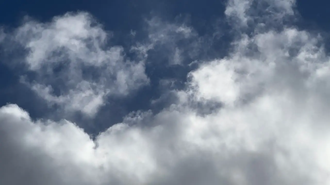 clouds slowly moving past camera