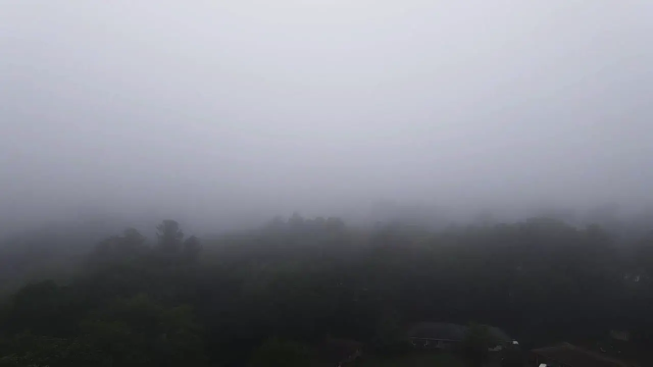 Aerial drone footage of a foggy morning