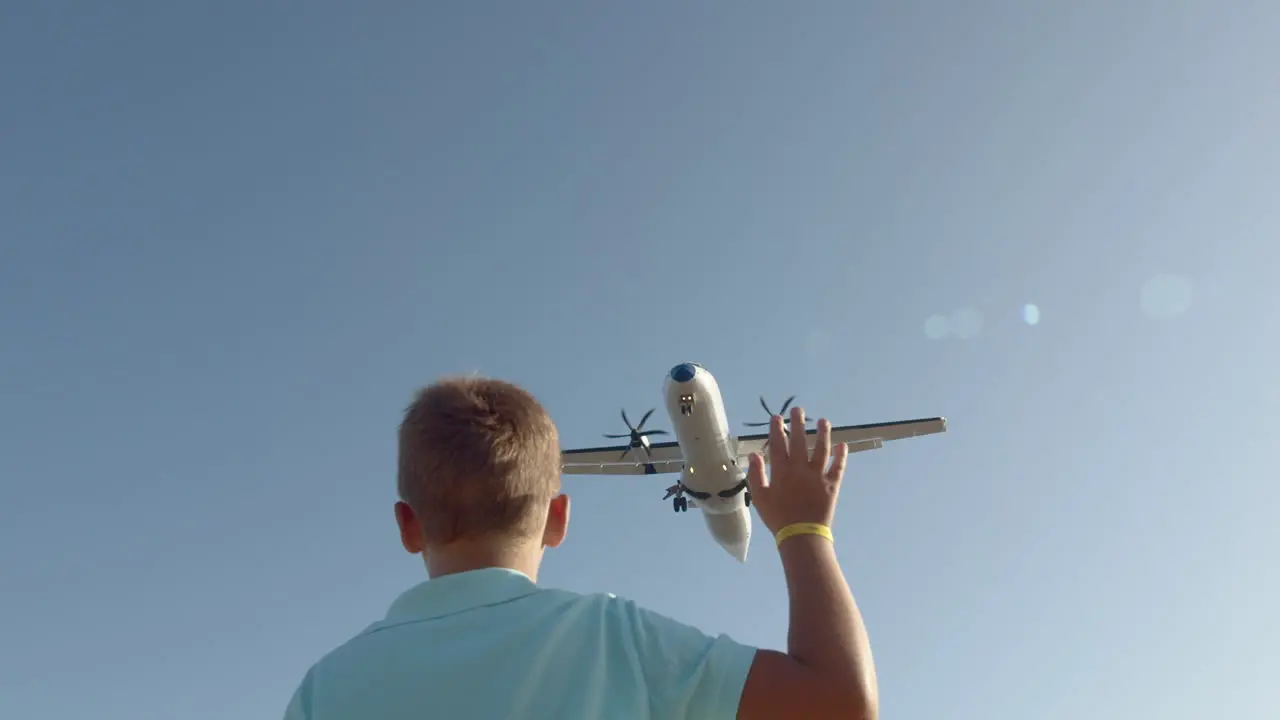 He is excited to see flying plane so close