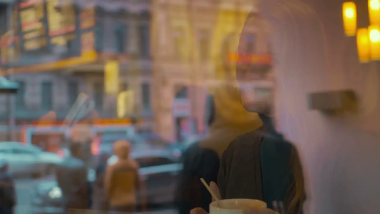 Woman and man talk drinking coffee in the restaurat