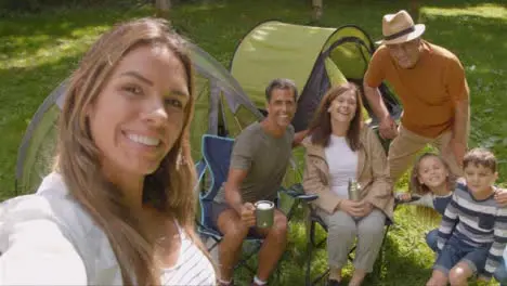 POV Shot of Family Taking Selfie Together On Camping Trip