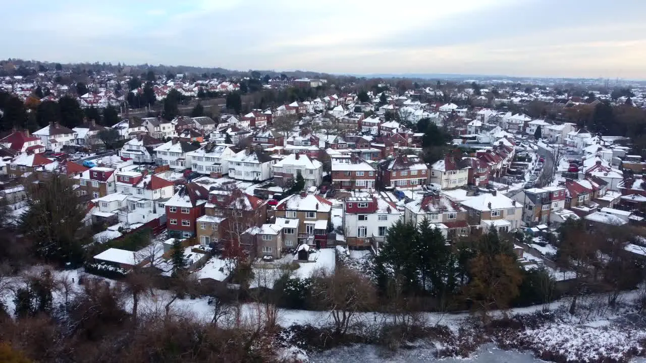 Establishing shot London suburb with snow in winter