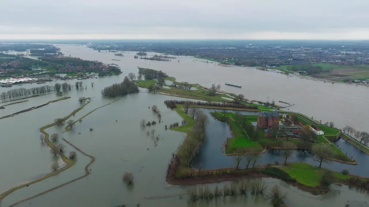 Flooding around river Waal and medieval Loevestein Castle Poederoijen