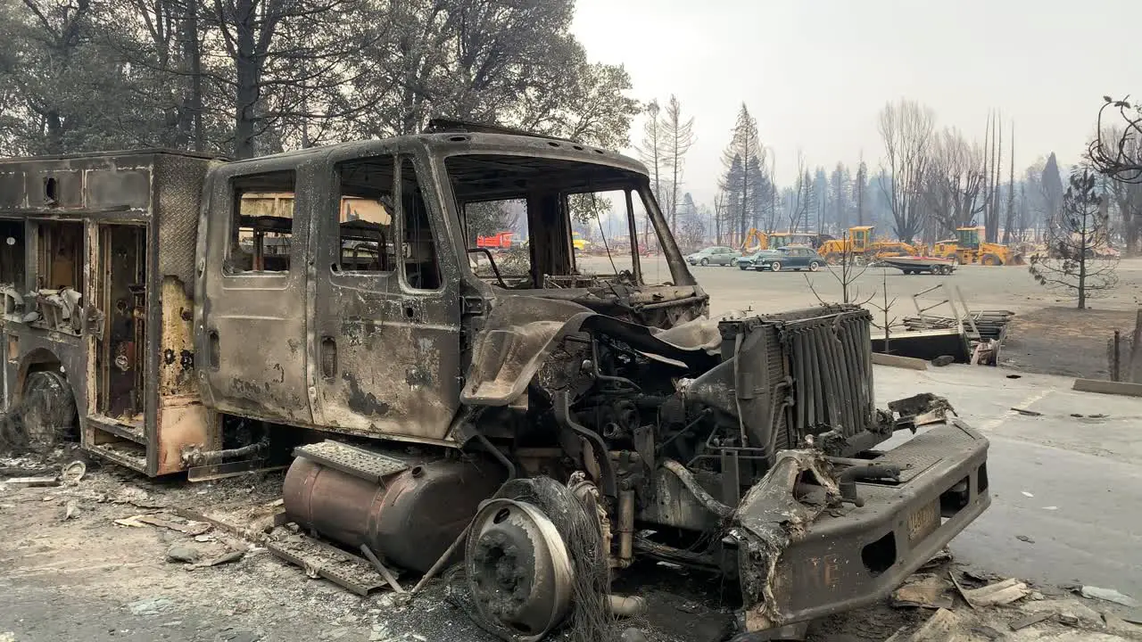 burned fire truck due to large damaging wildfire