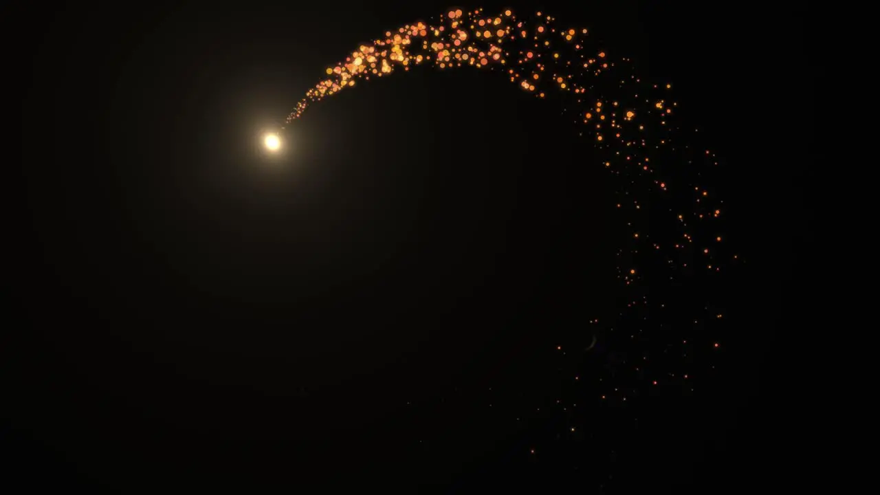 Christmas fire bengal trail with sparks Explosion of gold particles that open in a ring on a black background