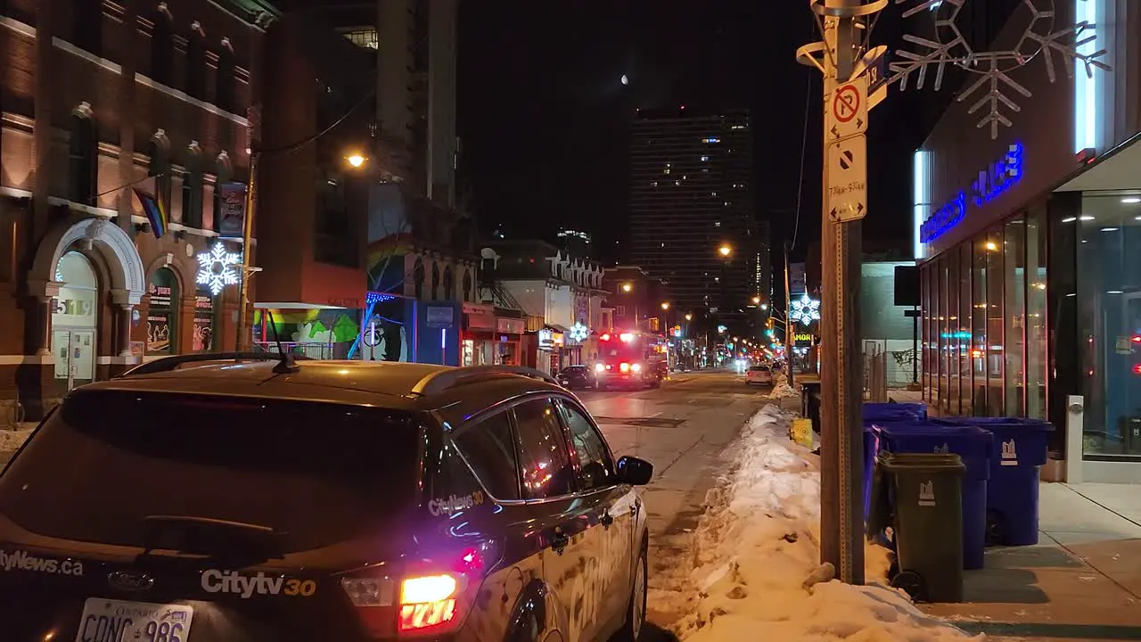 A fire truck arrives at the scene of a fire in Toronto that left a man dead