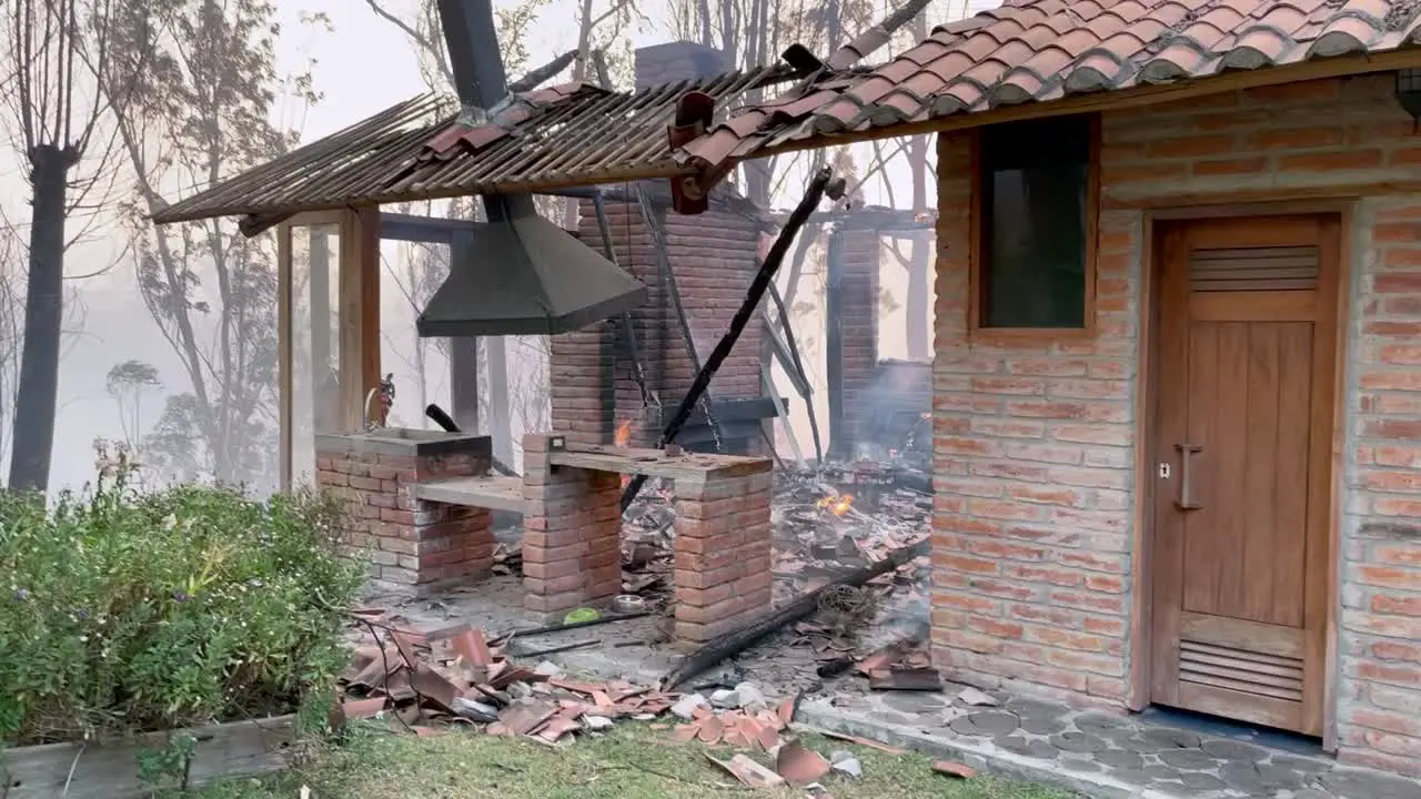 A house has been burnt to the floor by a wildfire