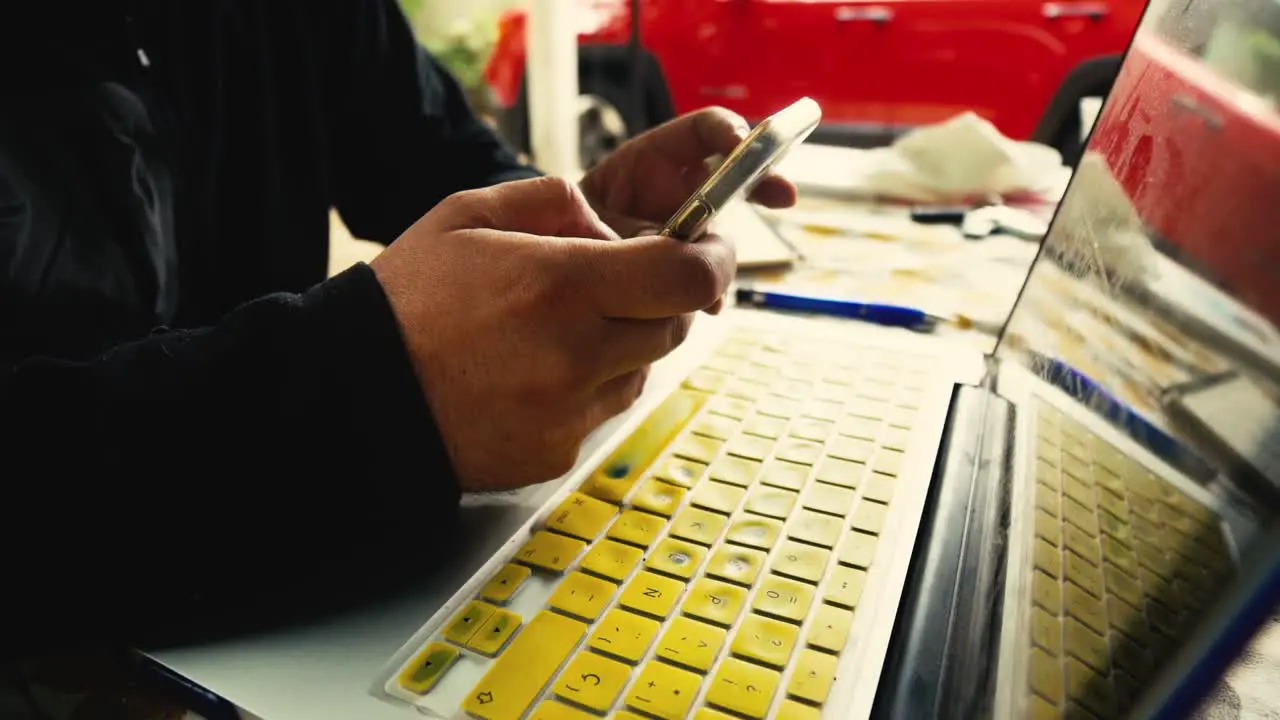 A guy working in his computer in the countryside mobile offices remote working