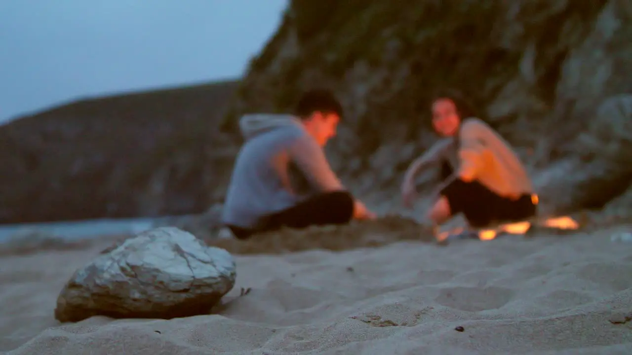 Sitting Around Beach Fire Pit