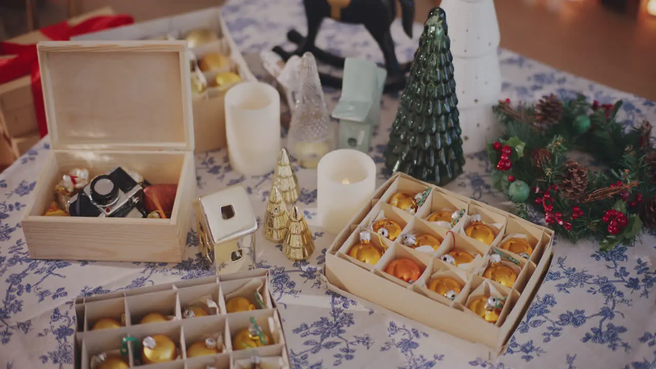 Baubles Xmas tree and lighting equipment on table